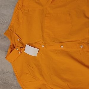 H&M long sleeve button up shirt size medium.